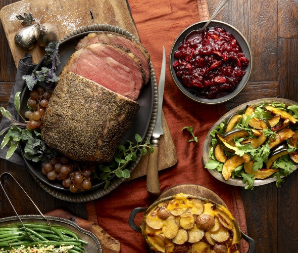 pre-cooked smoked prime rib with vegetable and fruit display 